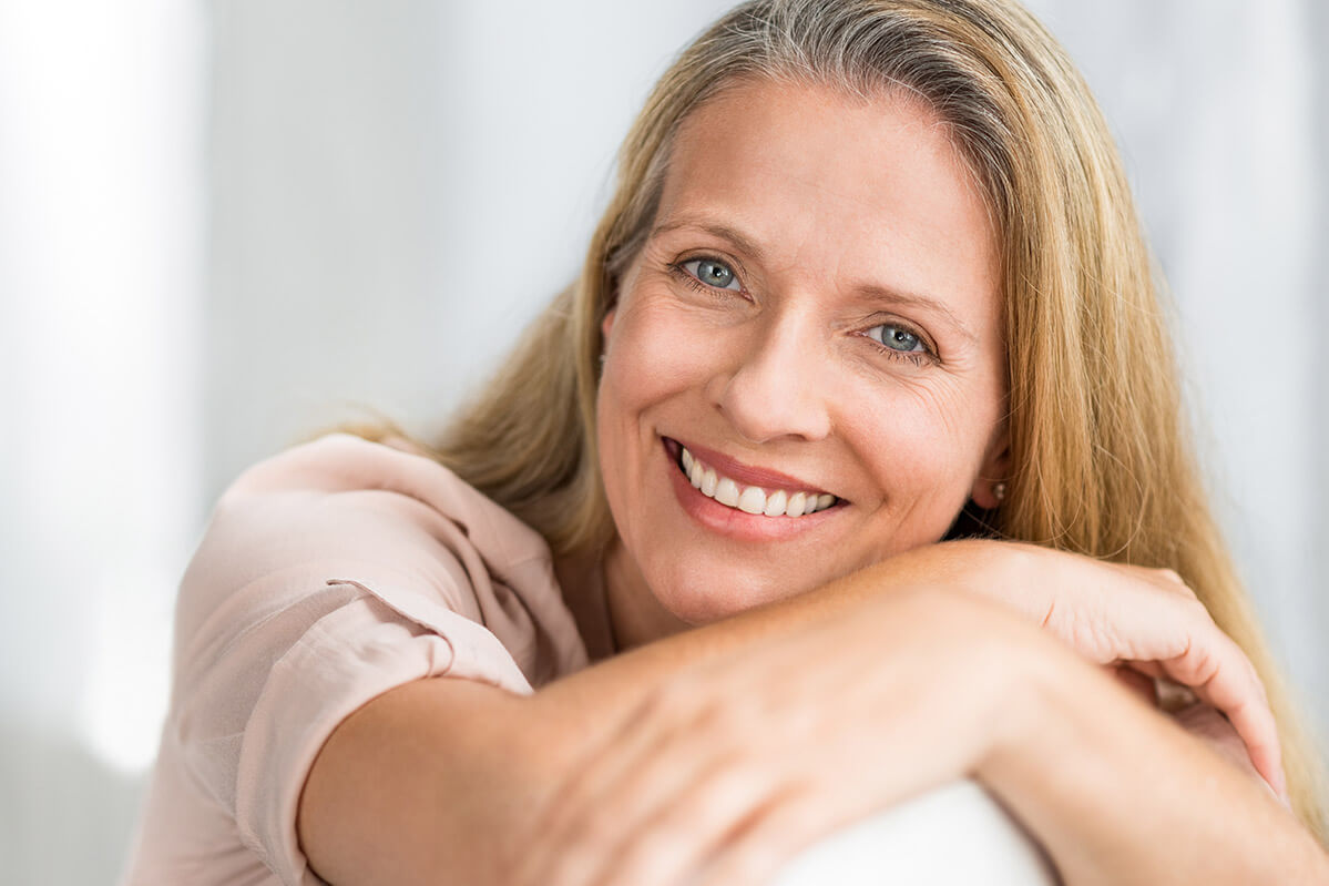 middle aged woman with artificial teeth